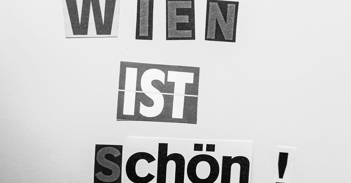 Creative typography art featuring the phrase 'Wien ist schön!' in black and white.