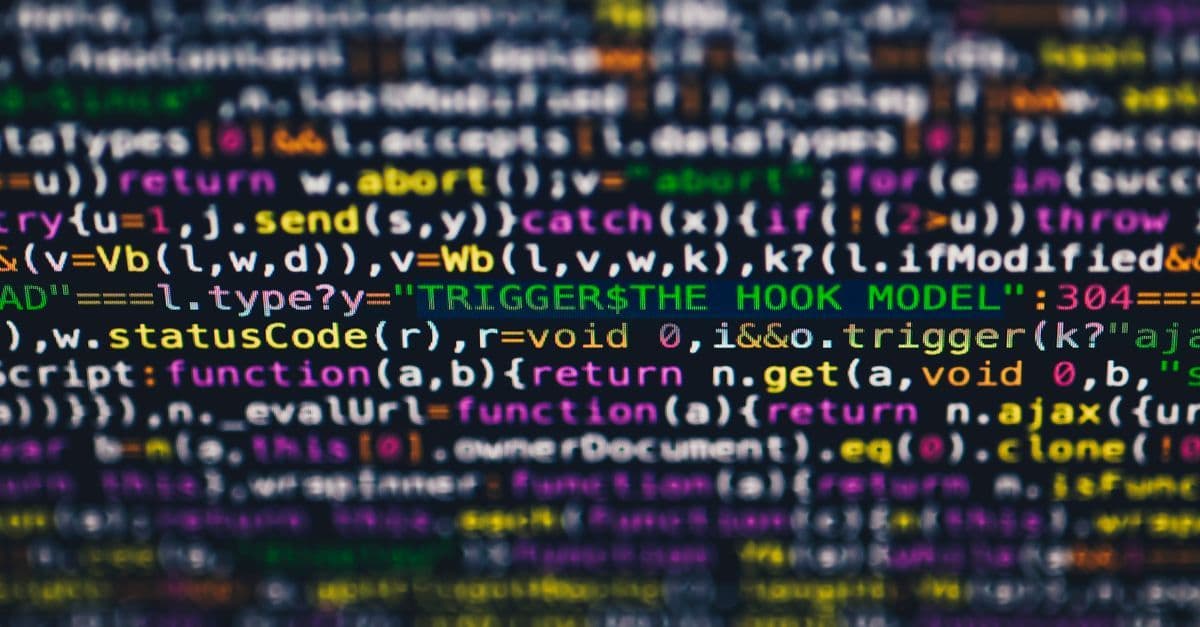Vibrant close-up of multicolor programming code lines displayed on a screen.